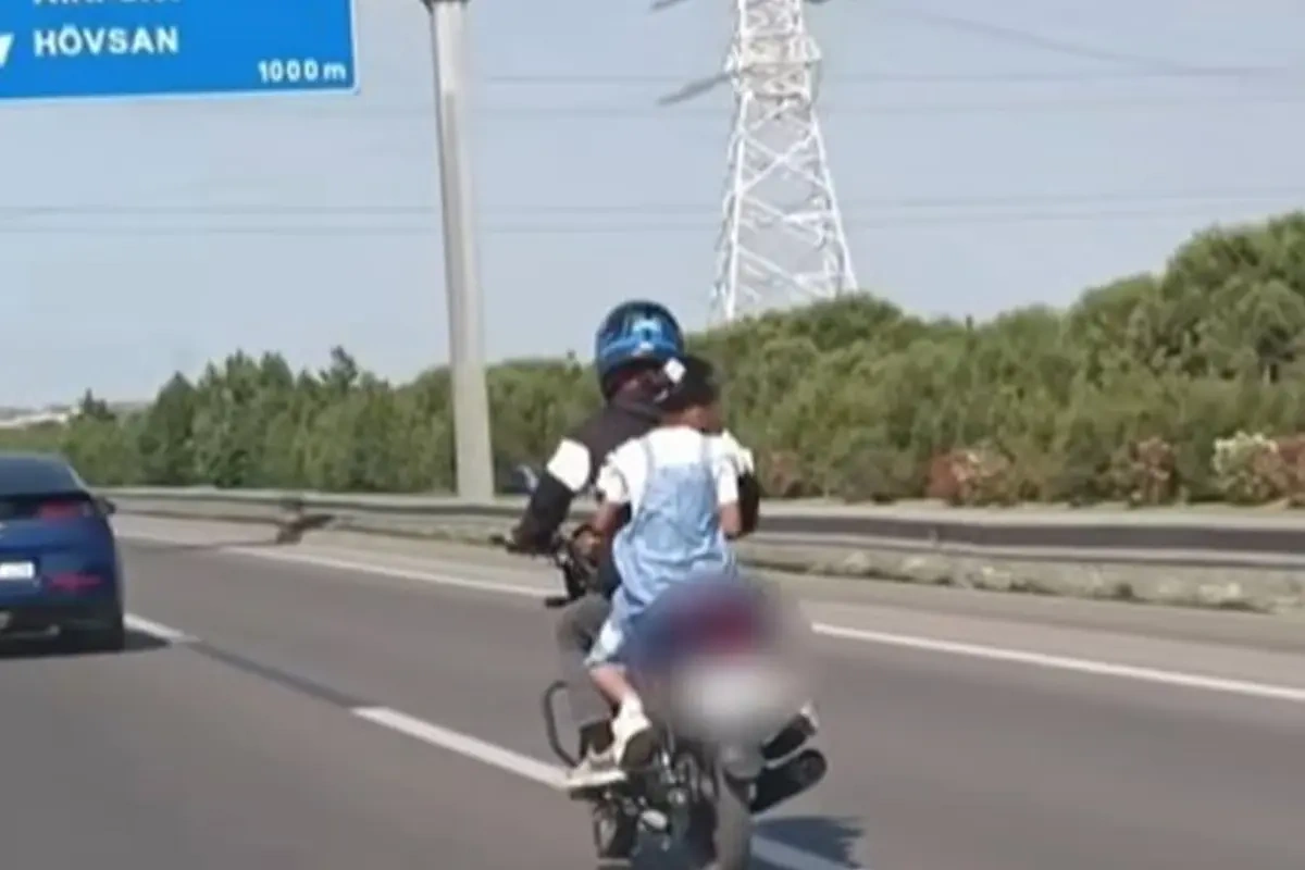 Sürətli yolda uşağın həyatını təhlükəyə atdı - Video